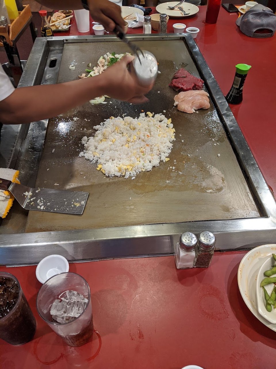 Restaurant menu with rice and soft drinks.