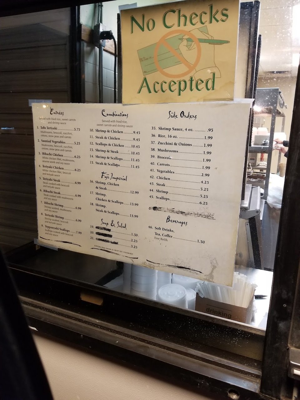 Takeout menu listing chicken, shrimp, and vegetables.